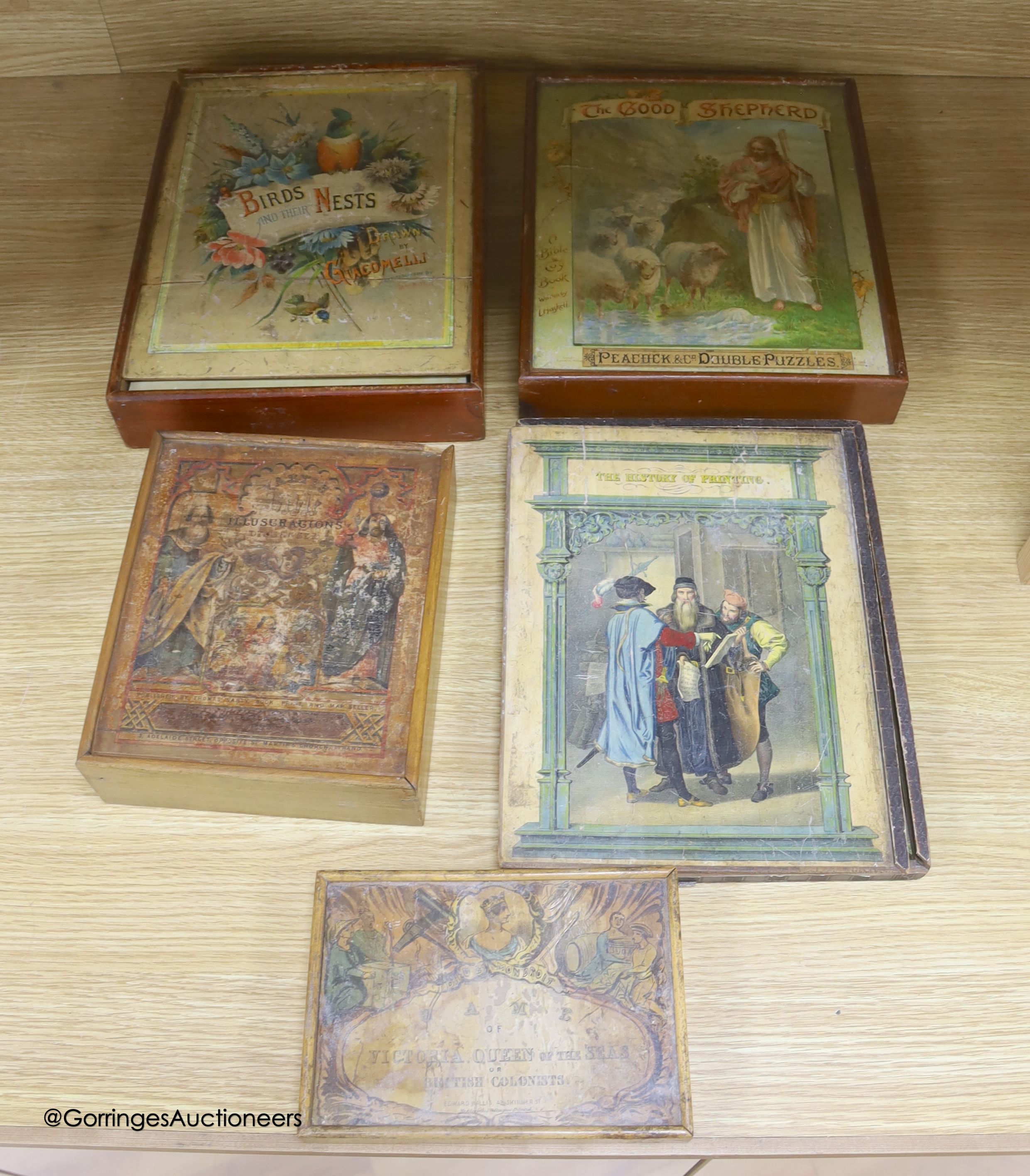 Five Edwardian boxed jigsaw puzzles, to include the history of printing, birds and their nests,