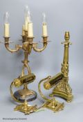 A figural cast brass table lamp, a pair of Art Deco wall lamps, a 3 branch wall light and a five