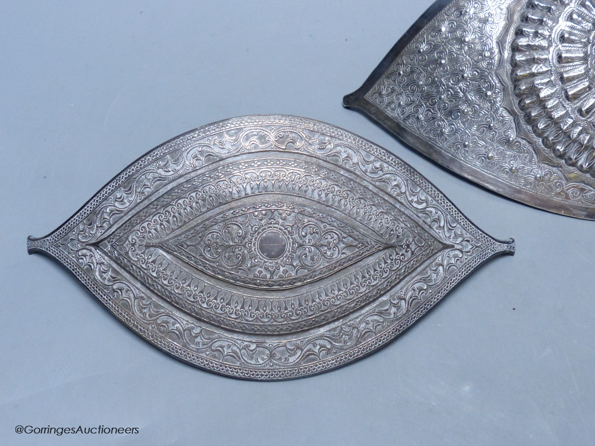 A Chinese Straits large white metal belt buckle, of curved navette form and a similar smaller - Image 2 of 4