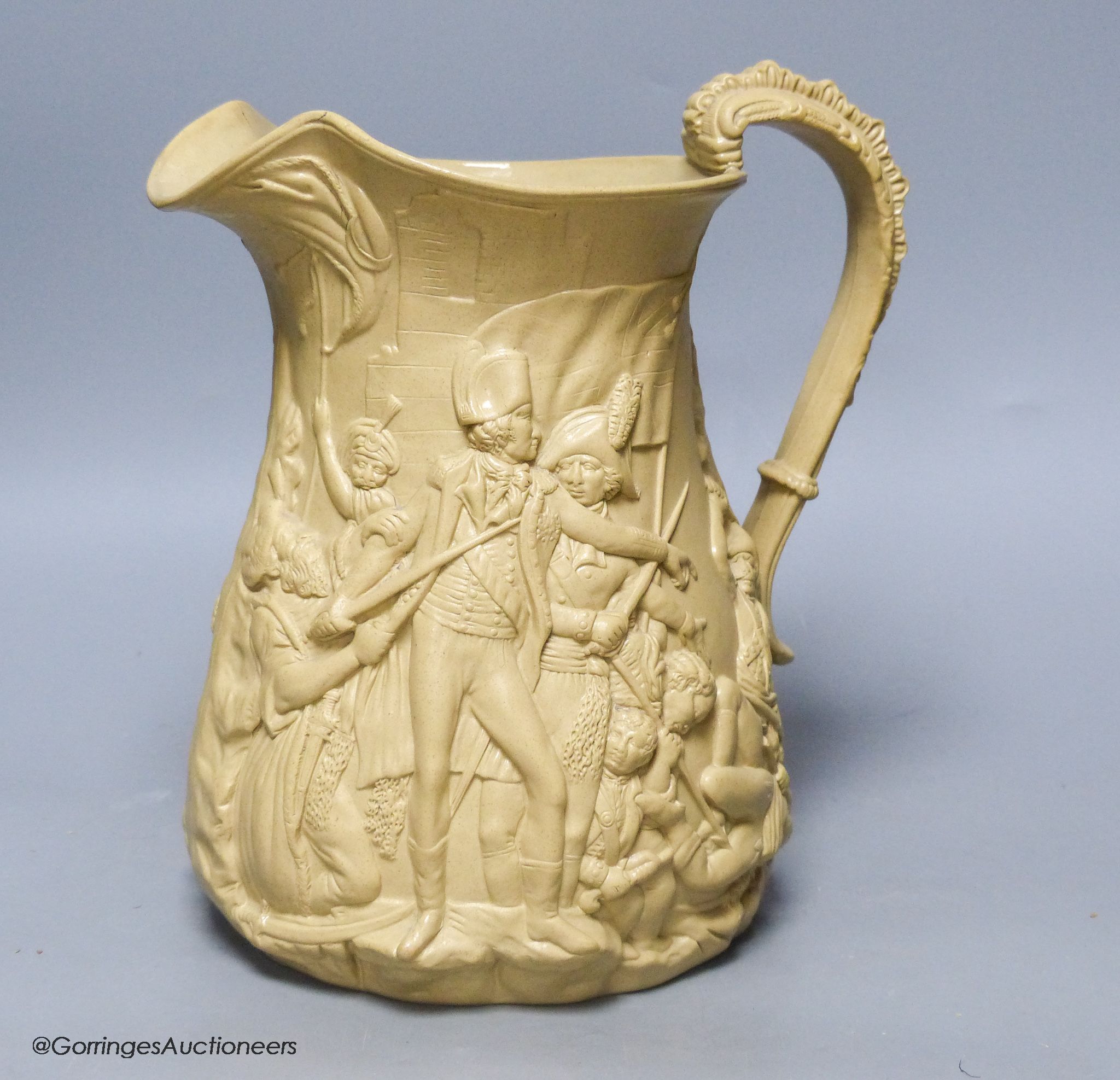 A Victorian relief moulded buff coloured stoneware jug by Samuel Alcock, The Seige of Acre, circa