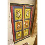 An Indian painted hardwood two door cabinet, width 85cm depth 38cm height 145cm