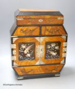 A Japanese lacquer and white metal mounted inlaid table cabinet, height 37cm