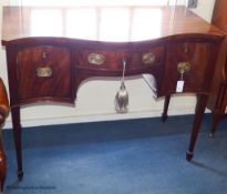 A George III and later mahogany serpentine fronted sideboard, 114.5 cm long, 61 cm deep, 87.5 cm