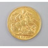 An Edward VII 1904 gold sovereign.