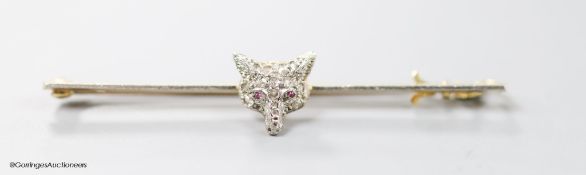 A late Victorian 15ct, pt and rose cut diamond set fox head bar brooch, 56mm, gross weight 3.4