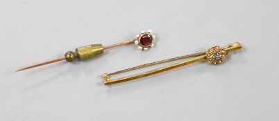 An Edwardian 15ct and gem set flower head bar brooch, 59mm, gross 3.7 grams and a yellow metal ,