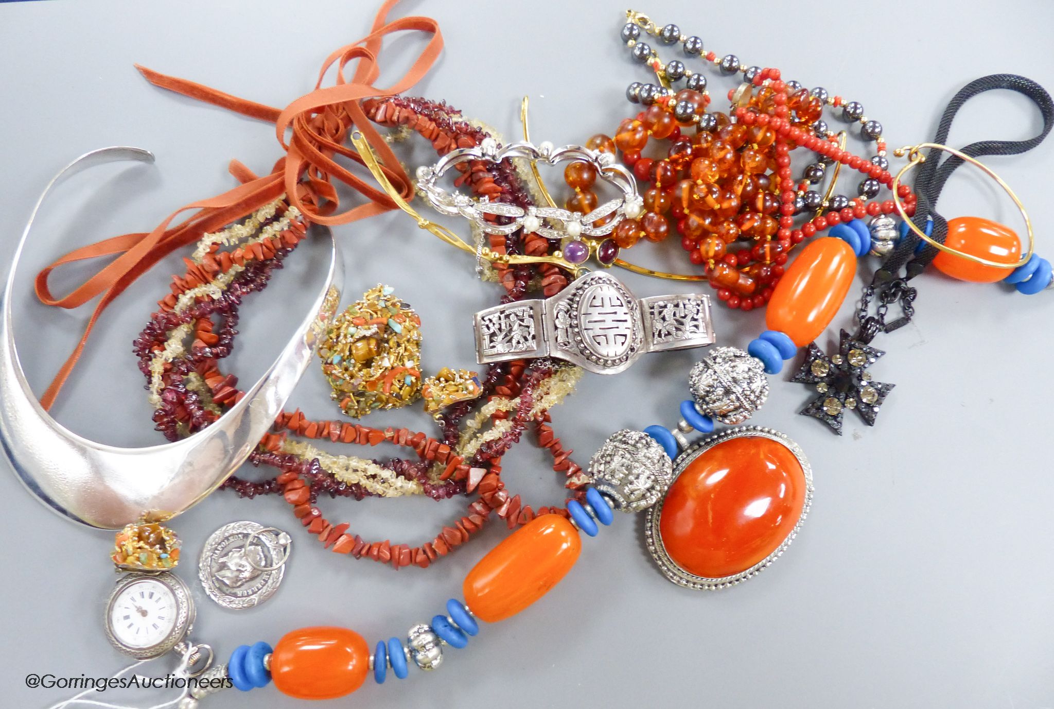 An Eastern heavy white metal and amber (?) ethnic style necklace, a multi-strand necklace by