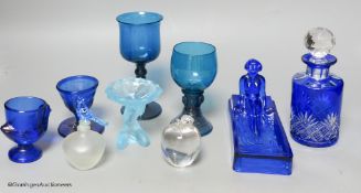 Nine pieces of coloured glassware, including a roemer, a wine glass and a cut glass scent bottle