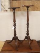 A near pair of reproduction mahogany torcheres, larger 100cm high