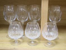 Four John Rocha Waterford wine glasses and three Stuart cut glass brandy glasses