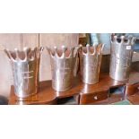 A set of four pierced copper wall sconces. Largest, H-33cm.