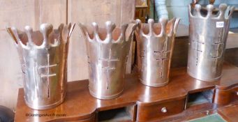 A set of four pierced copper wall sconces. Largest, H-33cm.