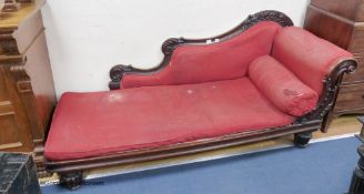 A Victorian mahogany chaise longue. Length-208, Depth-72, Height-77cm.