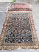 A Shirvan rug (worn) 160 x 120cm and a smaller North West Persian rug