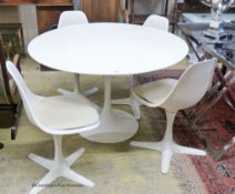 An Arkana tulip table, 120cm diameter, height 74cm and four tulip chairs