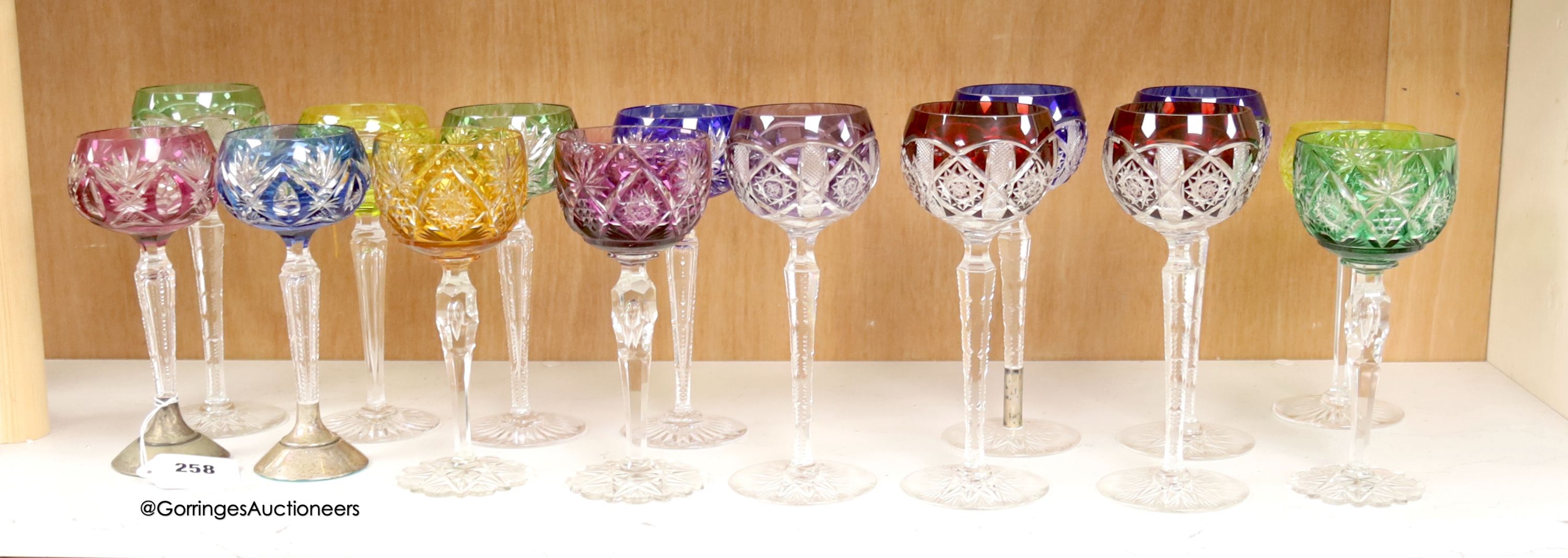 A harlequin collection of flash cut hock glasses, 19th century and later, tallest 21cm