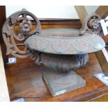 A cast iron garden urn, W-42,H-30.