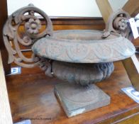 A cast iron garden urn, W-42,H-30.