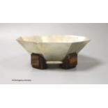 A German? Art Deco 800 standard white metal octagonal fruit bowl, on four stepped coromandel wood