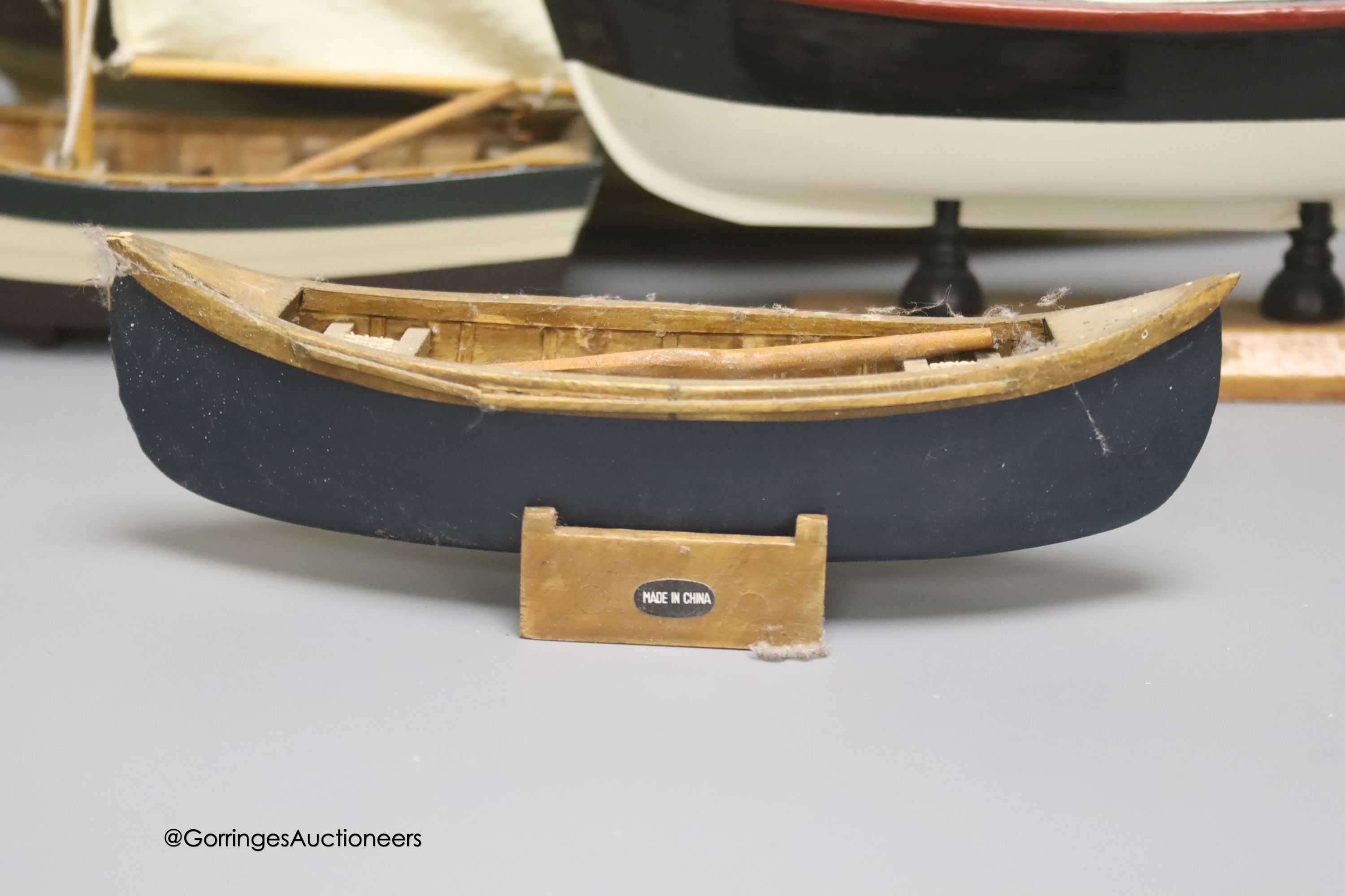 A clinker-built wood rowing boat, 41cm, and four smaller boat models - Image 3 of 8