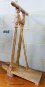 A Victorian oak boot jack, width 52cm, height 82cm