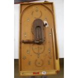 A vintage bird scarer and a Chad Valley bagatelle board