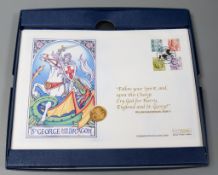 A 2004 St George and The Dragon gold sovereign with presentation cover and certificate of