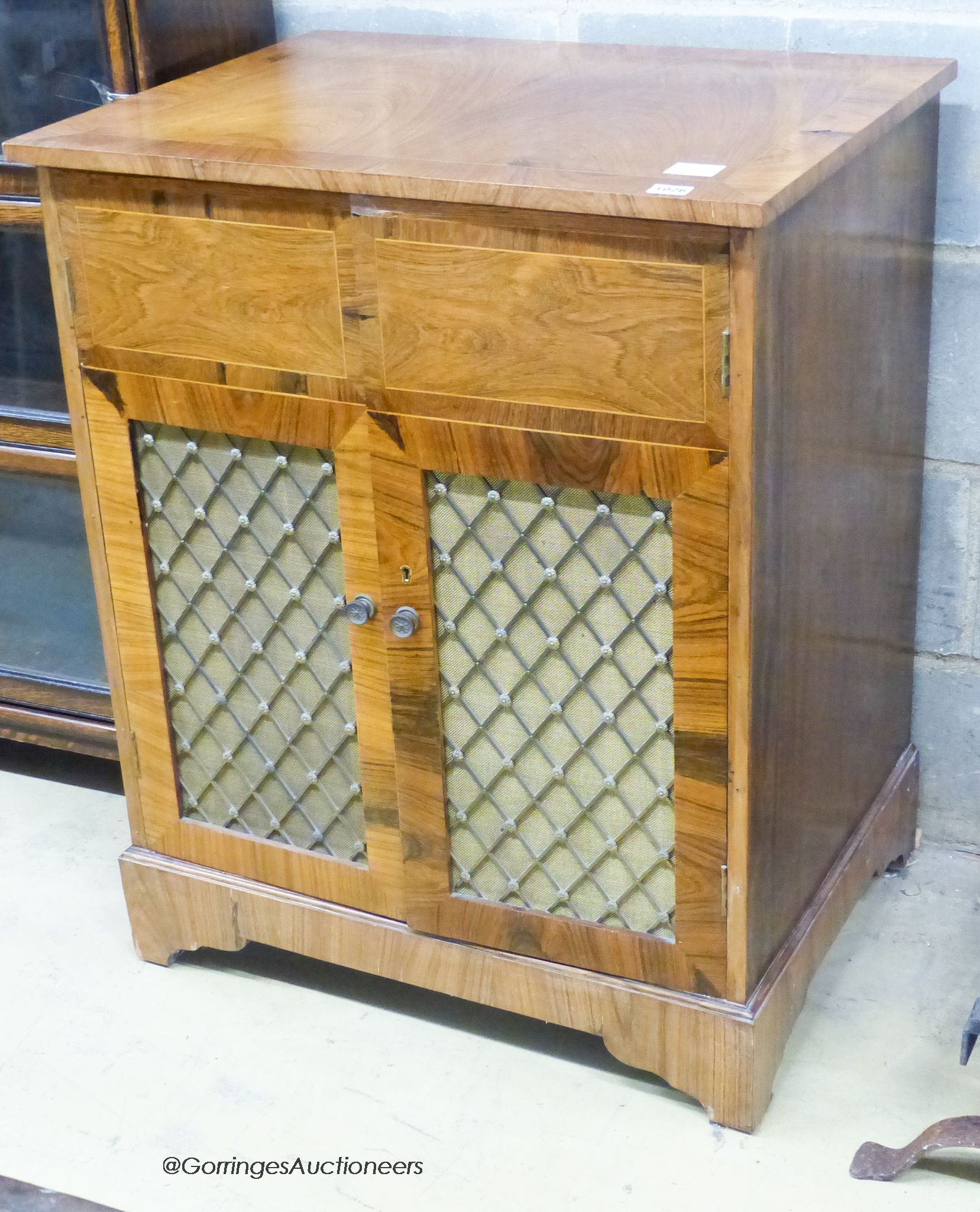 A small rosewood banded two door music cabinet, length 70cm, depth 53cm, height 87cm