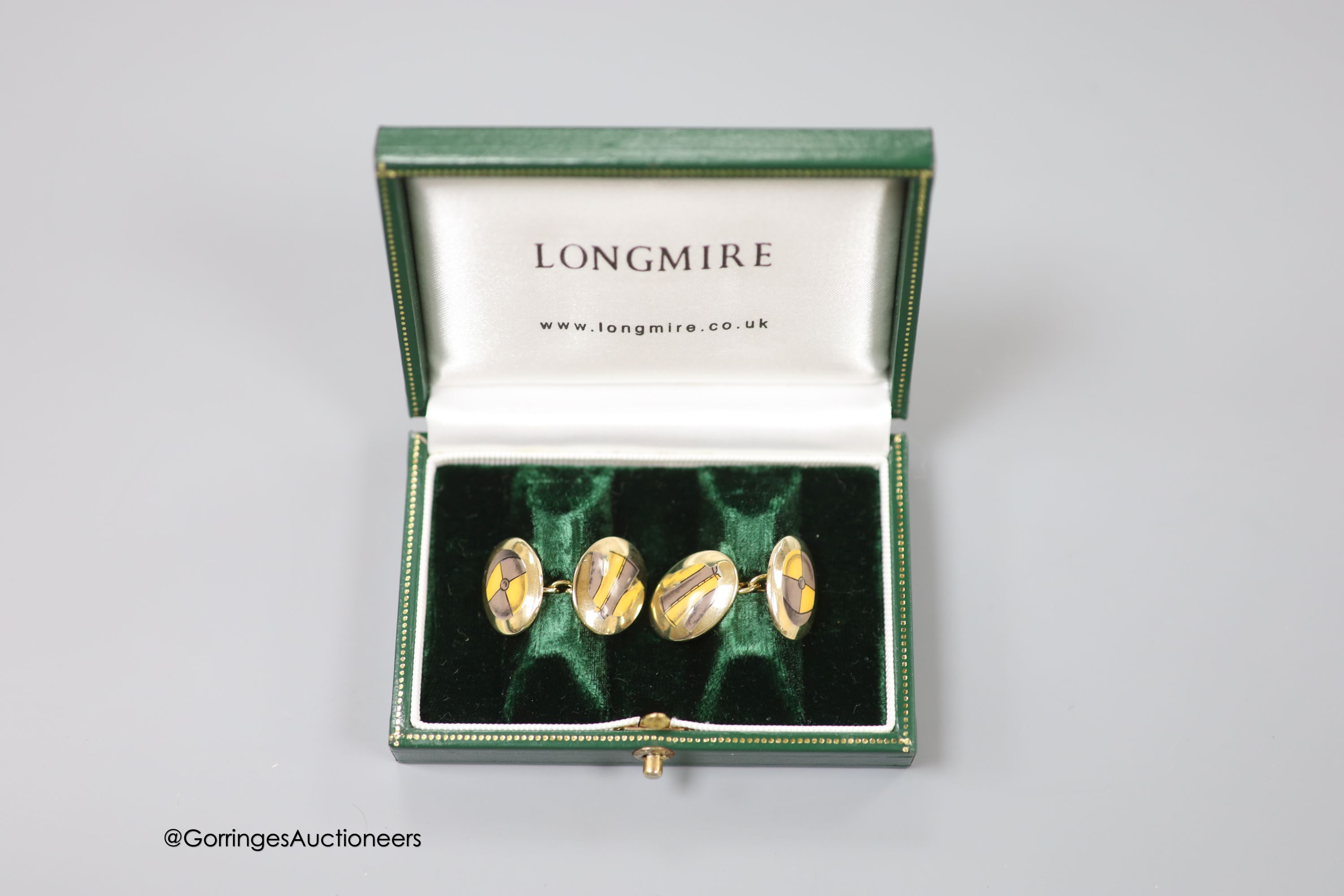 A cased modern pair of silver gilt and enamel Longmire oval cufflinks, decorated with jockey cap - Image 3 of 3