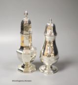 A George V silver panelled sugar caster, Birmingham, 1935, 22.3cm and a smaller earlier silver
