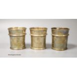 A pair of George V Brittania standard silver beakers, with engraved inscription, W. H. Haseler Ltd,