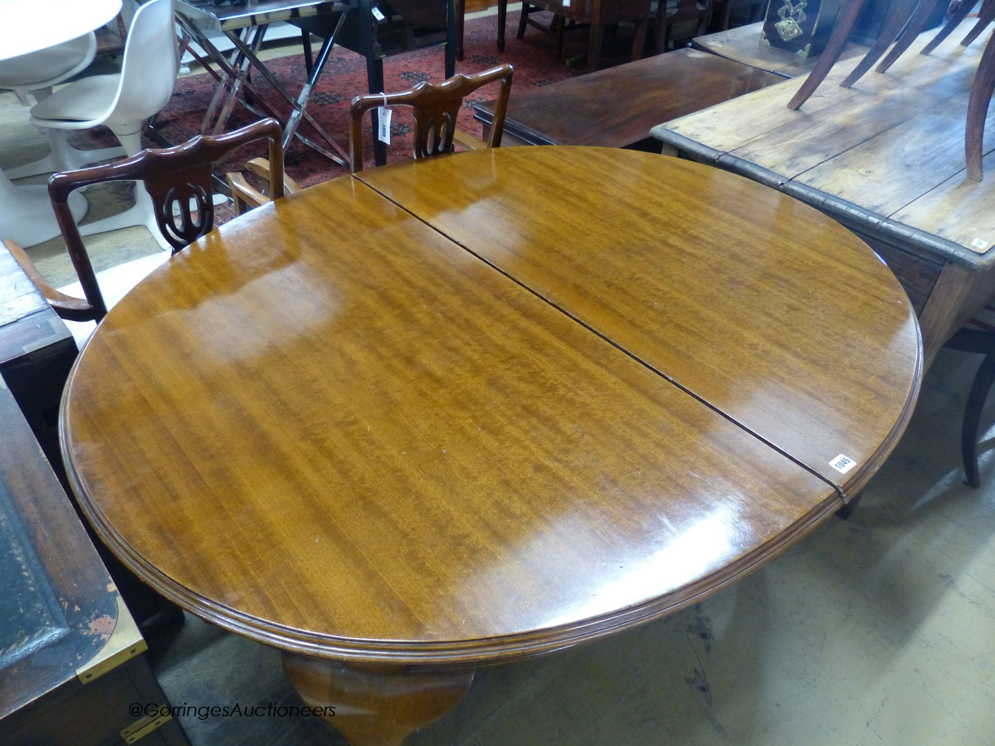 A 1920's mahogany extending dining table, length 141cm, depth 110cm, height 76cm - Image 2 of 2
