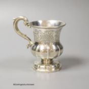 A mid 19th century Indian Colonial white metal vase shaped christening mug, by George Gordon & Co,