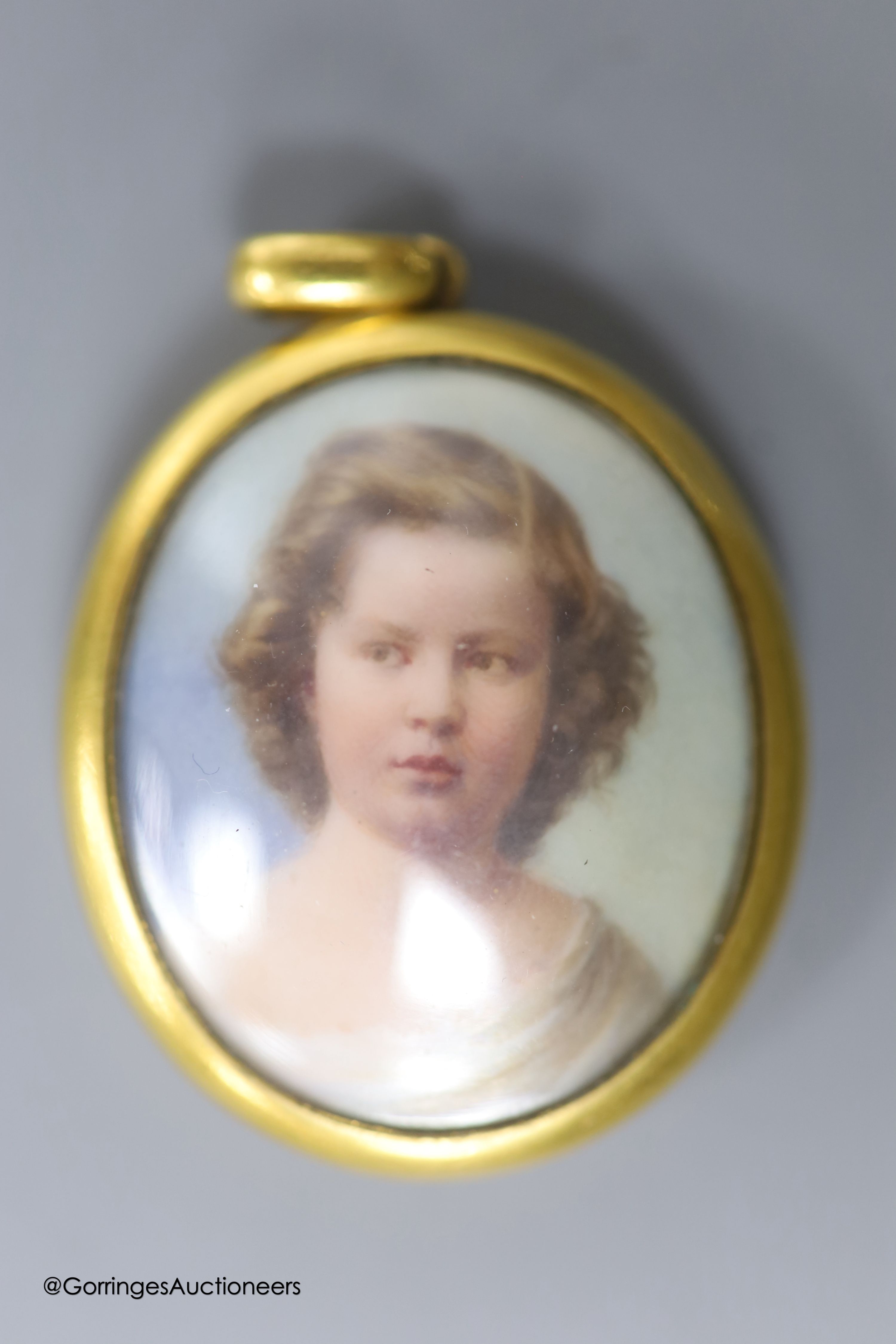 A Victorian yellow metal mounted glazed oval pendant, with miniature portrait of a young lady and - Image 6 of 7