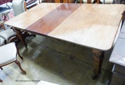 A mid Victorian mahogany extending dining table, 184cm extended with one spare leaf, width 109cm,