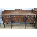 A Regency mahogany inverse breakfront sideboard. W-184, D-60, H-108cm.