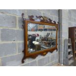 A Georgian style satin wood banded fret frame wall mirror. W-119, H-97cm.