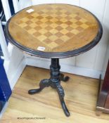 A Victorian mahogany tripod chess table. D-54, H-68cm.