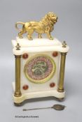 A Victorian alabaster mantel clock, with gilt metal lion surmount, French skeleton movement with