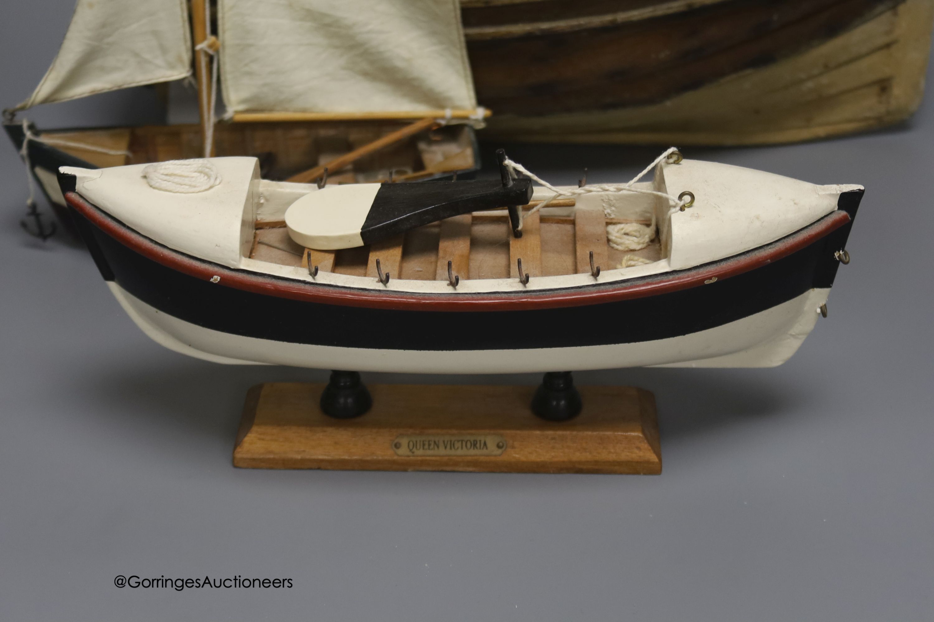 A clinker-built wood rowing boat, 41cm, and four smaller boat models - Image 5 of 8
