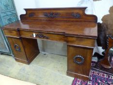 A Victorian mahogany break front pedestal sideboard, length 184cm, depth 56cm, height 125cm