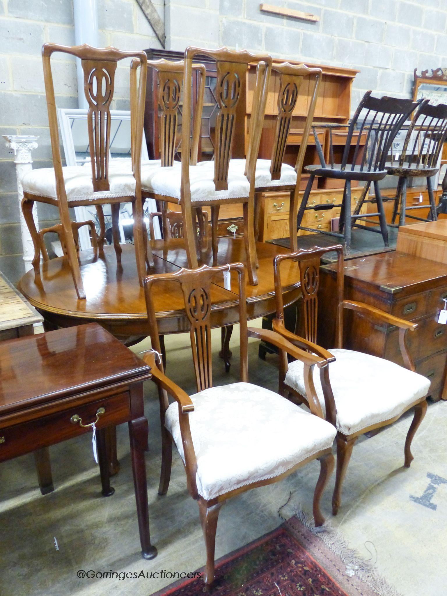 A set of eight Edwardian mahogany dining chairs (two with arms)