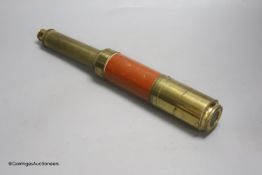 A Dolland of London three drawer brass and leather telescope, fully extended 83cm