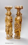 A pair of 17th century carved oak figures41cm