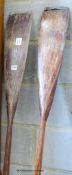 A pair of vintage wooden oars