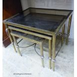 A nest of three brass and glass top tables. W-56cm, D-46cm, H-46cm.