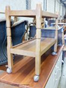 An Arts & Crafts Yorkshire School Malcolm Pipes Foxman oak trolley with original Shepherd castors