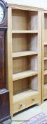 A contemporary light oak open bookcase, length 98cm, width 35cm, height 190cm