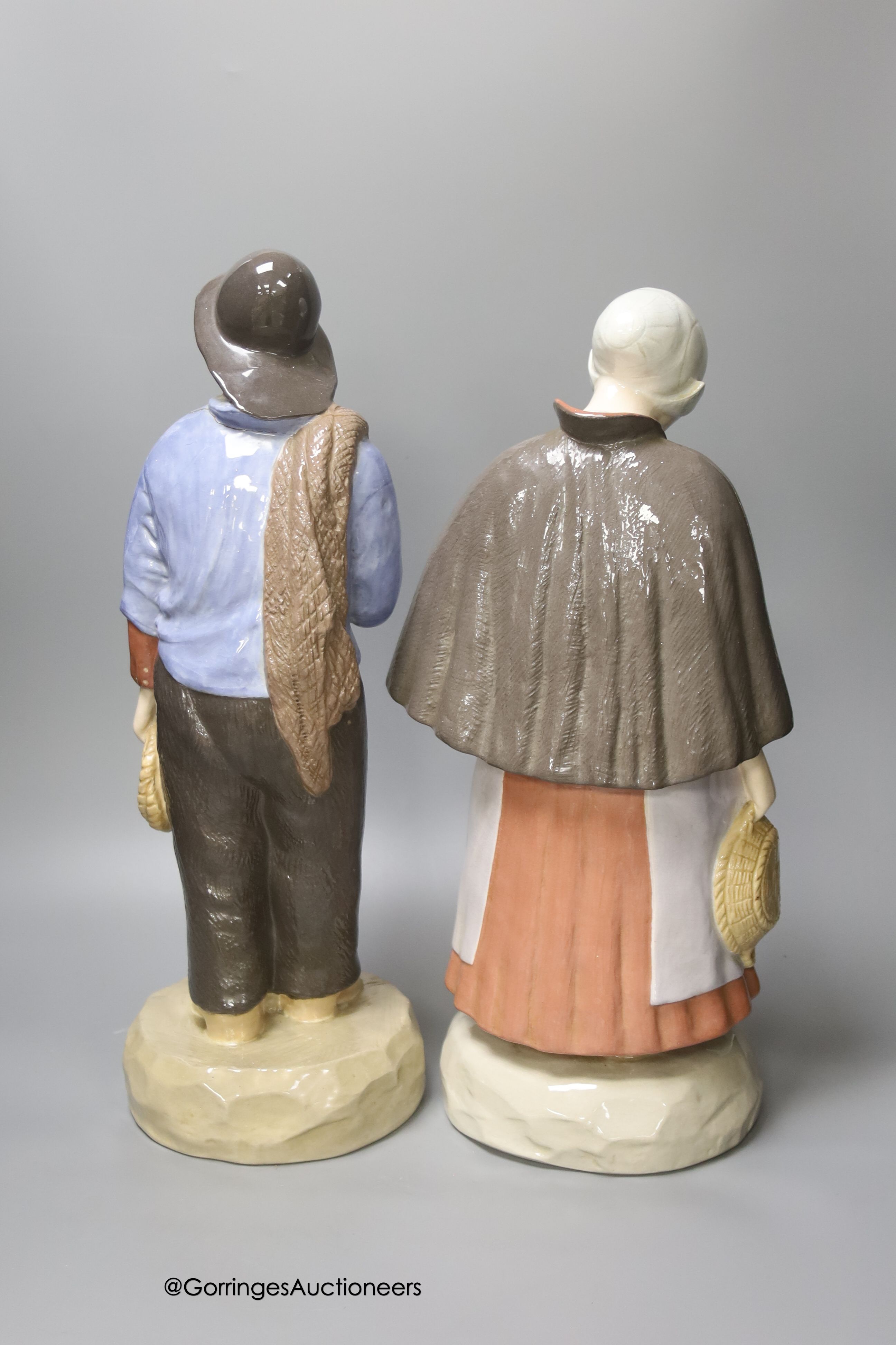 A pair of large Gouda pottery figures of a fisherman and fisherwoman, entitled 'Scheveningen', 41cm - Image 3 of 4