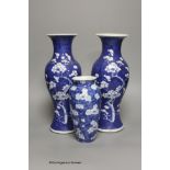 A pair of late 19th century Chinese prunus blossom baluster vases, 30cm, and a Japanese ovoid vase